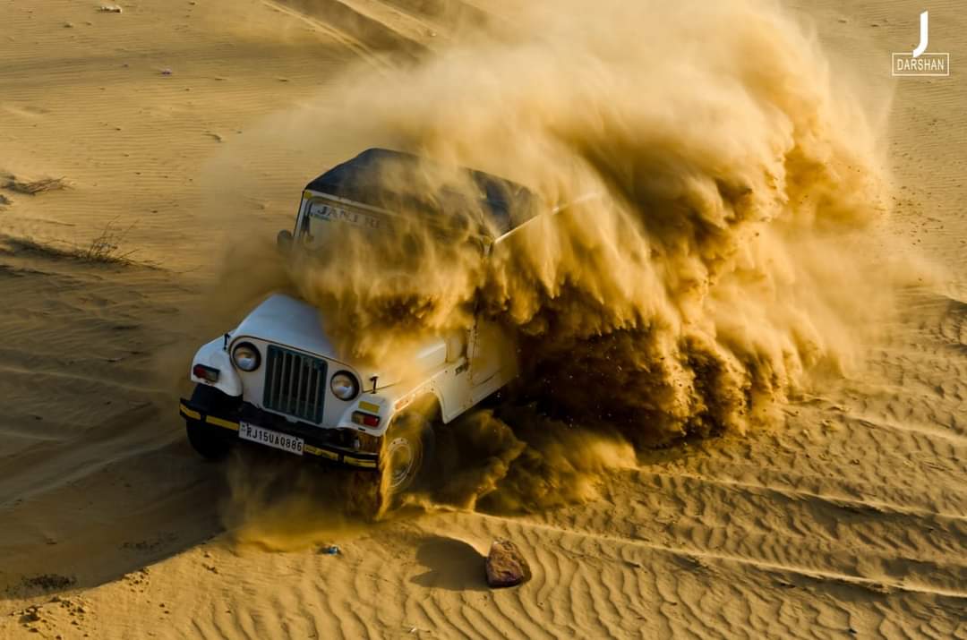 Dune bashing at sunset