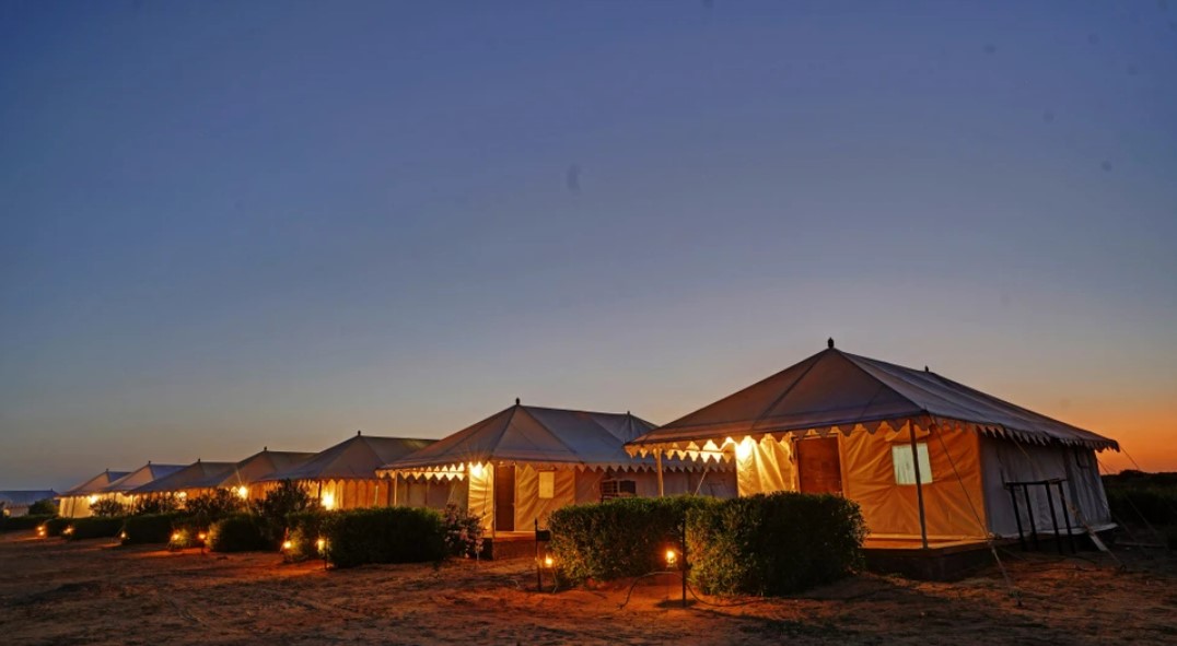 Tents lit up at night